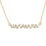 An 18ct gold baguette-cut diamond pendant, with integral chain, by Suzanne Kalan.