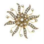 An early 20th century 9ct gold split pearl spray brooch / pendant.