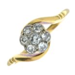 An early to mid 20th century 18ct gold old-cut diamond cluster twist ring.