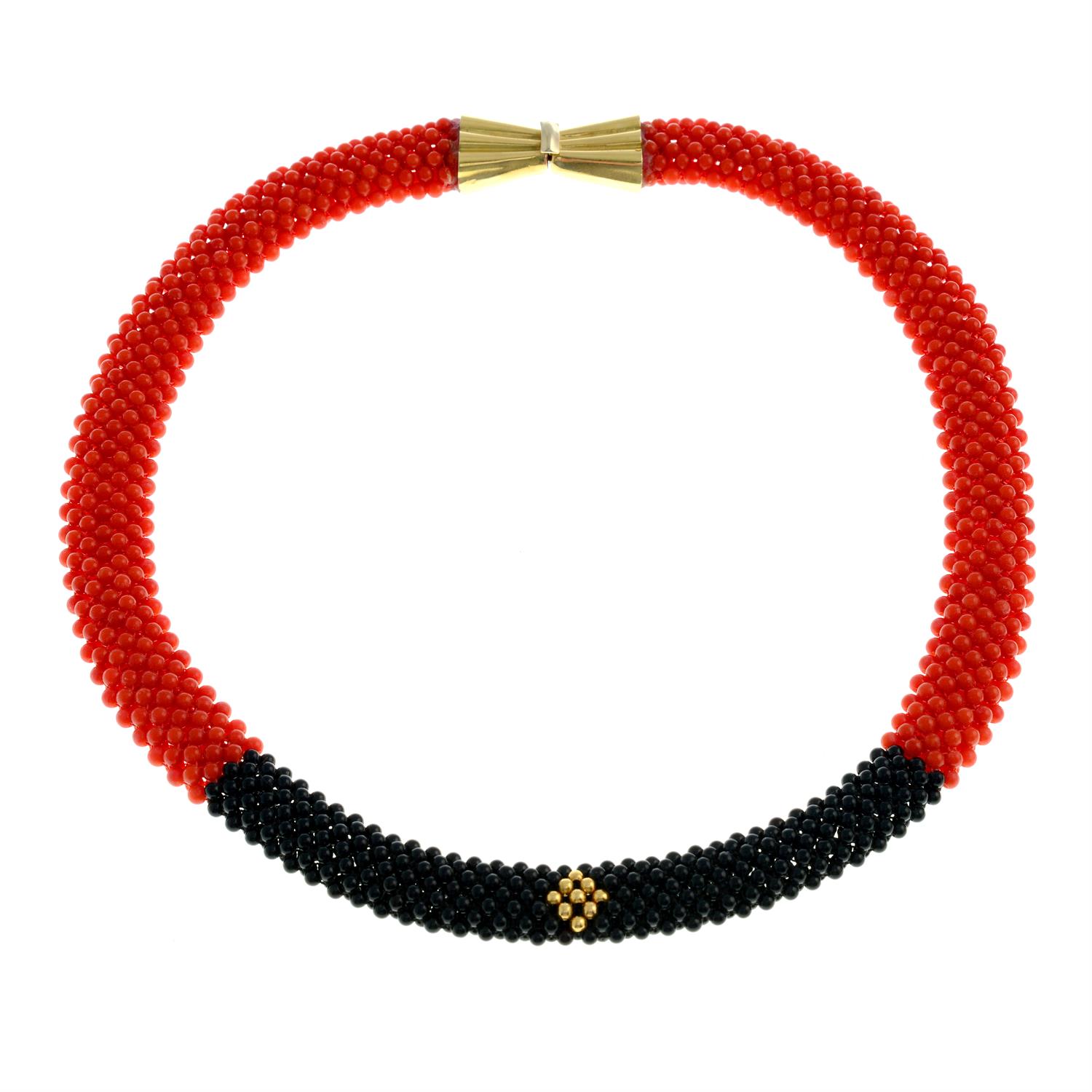 A coral and onyx bead necklace.