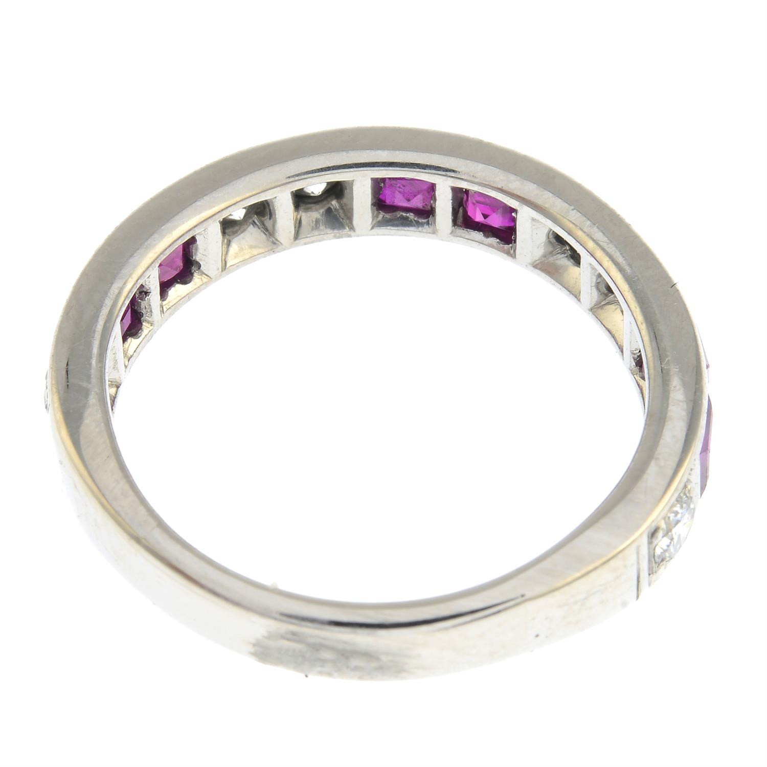 A ruby and diamond half eternity ring. - Image 2 of 2