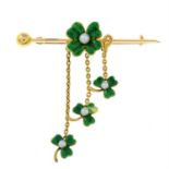 A mid 20th century green enamel and seed pearl shamrock brooch.