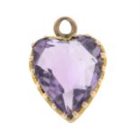 An early 20th century gold amethyst heart-shape pendant / charm.