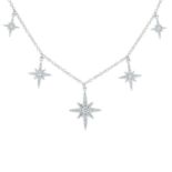 A brilliant-cut diamond star fringe necklace.