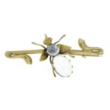 A late 19th century 9ct gold moonstone bug bar brooch.