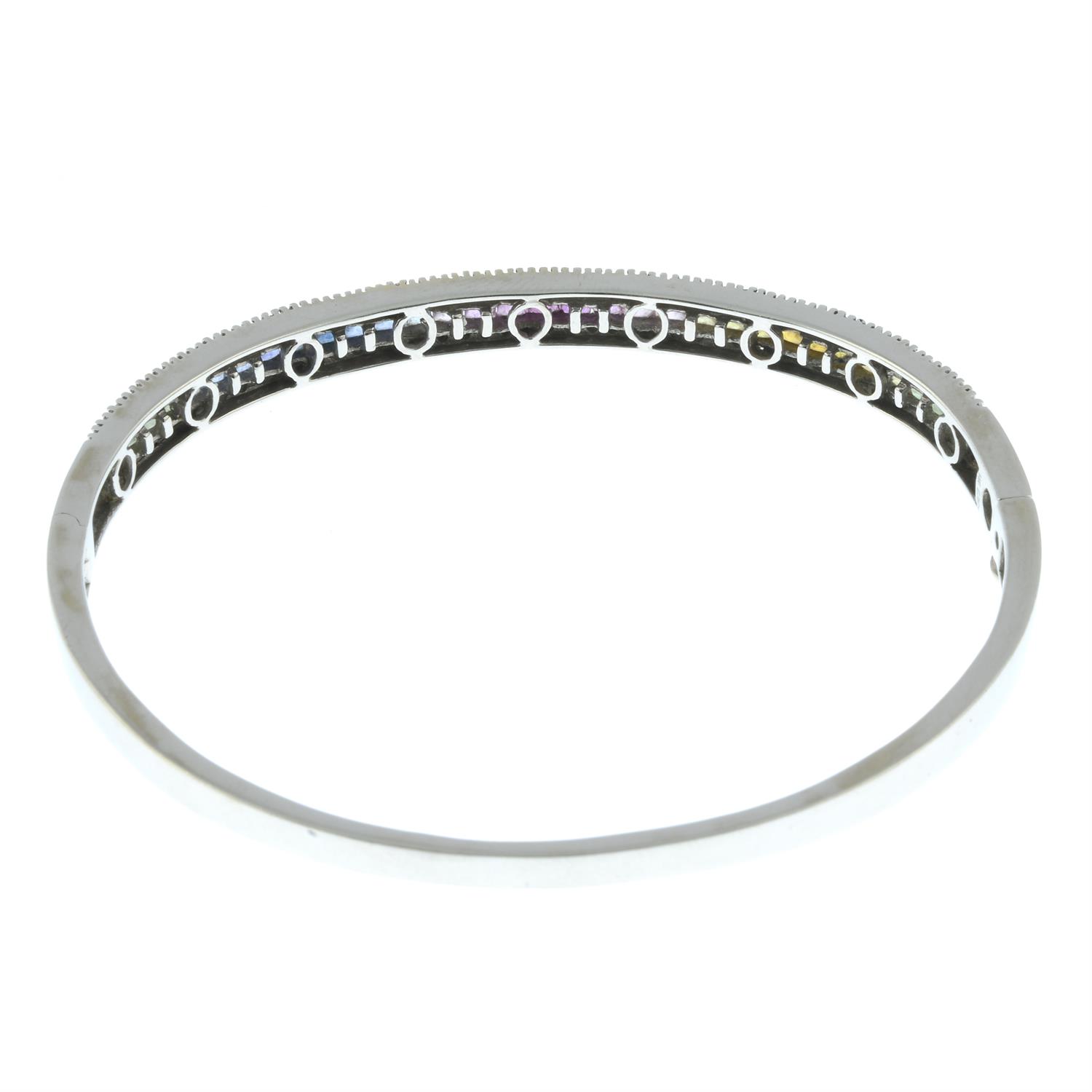 A vari-hue sapphire and diamond hinged bangle. - Image 2 of 2