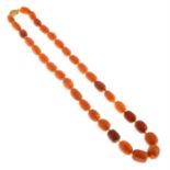 A slightly graduated amber necklace.