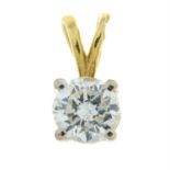 An 18ct gold brilliant-cut diamond single-stone pendant.