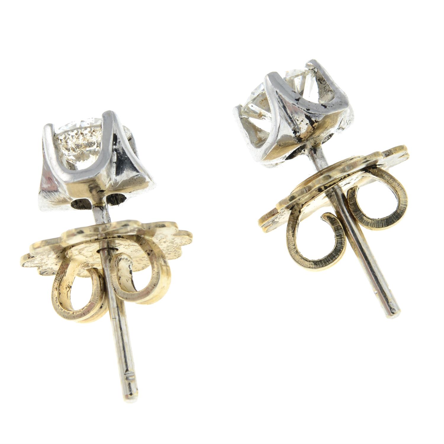 A pair of brilliant-cut diamond single-stone earrings. - Image 2 of 2