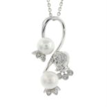 A 9ct gold cultured pearl and diamond floral pendant, with chain.
