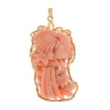 A mid 20th century 14ct gold carved coral pendant.