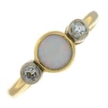 An opal and diamond three-stone ring.