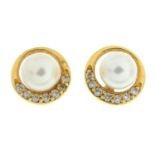 A pair of cultured pearl and brilliant-cut diamond earrings.