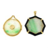 Two jade and onyx pendants.
