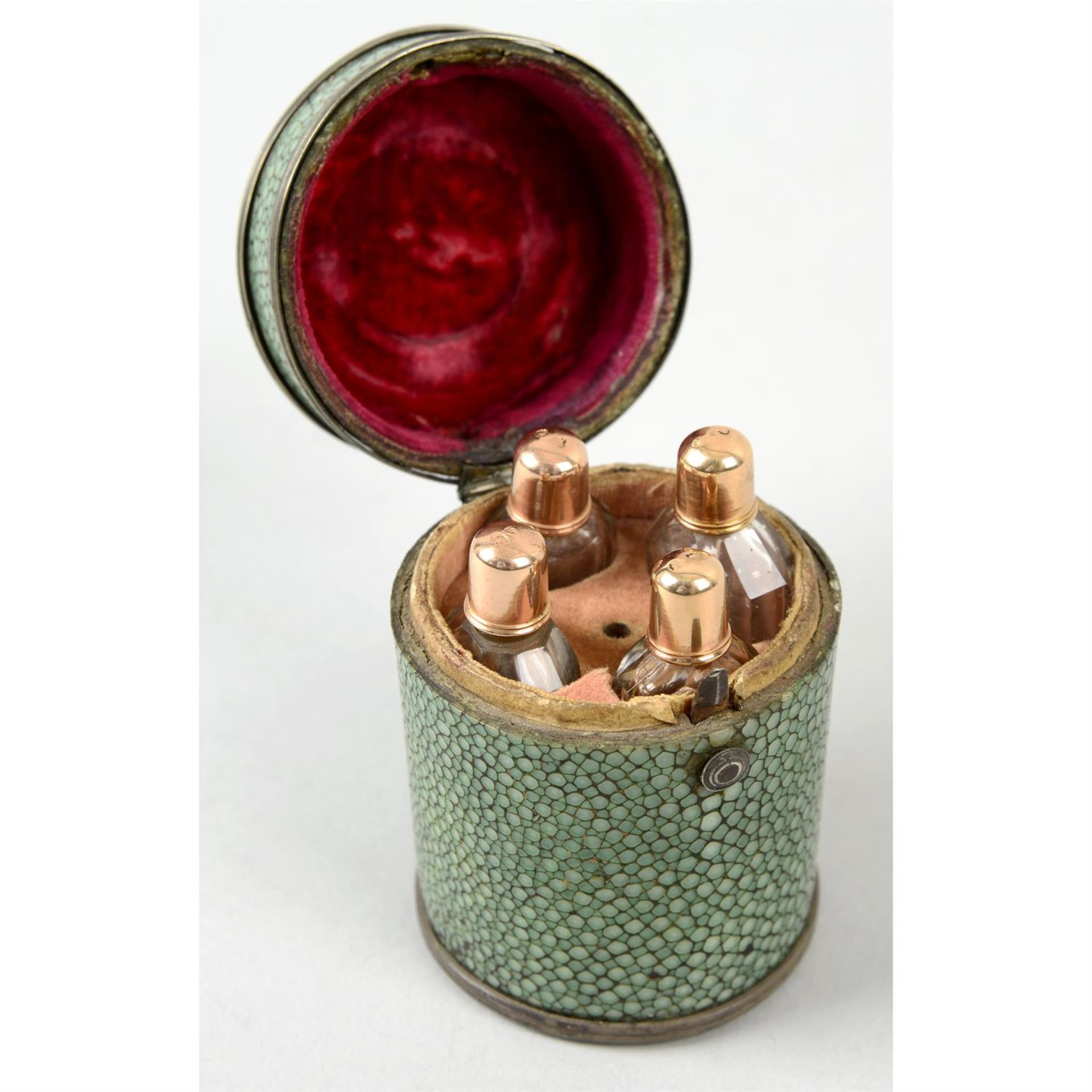 A shagreen cased travelling perfume set.