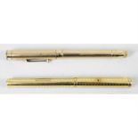 A Swan Mabie Todd & Co 18 carat gold cased fountain pen, together with a similar example.