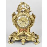 A 19th Century gilt mantel clock.