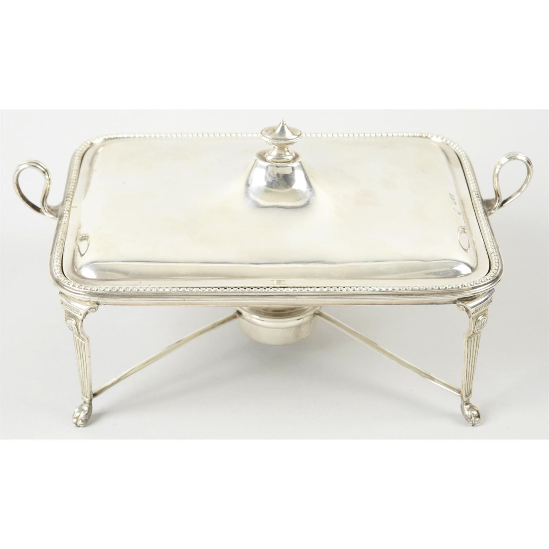 A late Victorian silver breakfast warming dish on stand with removable burner.