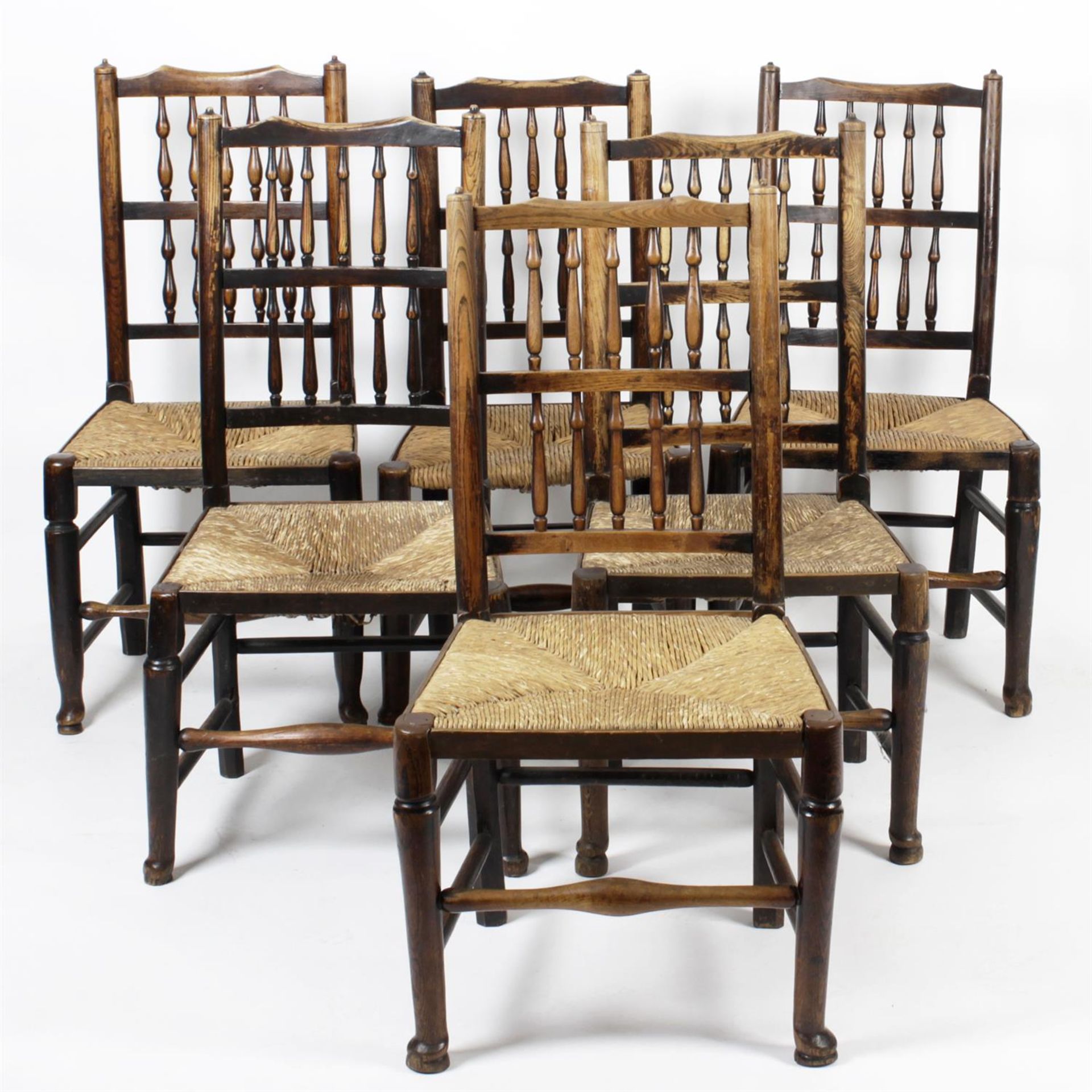 A composed set of twelve 19th century dining room chairs.