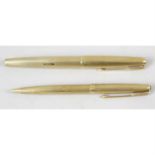 Two 18 carat gold Parker pens.