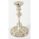 A George II silver cast candlestick.