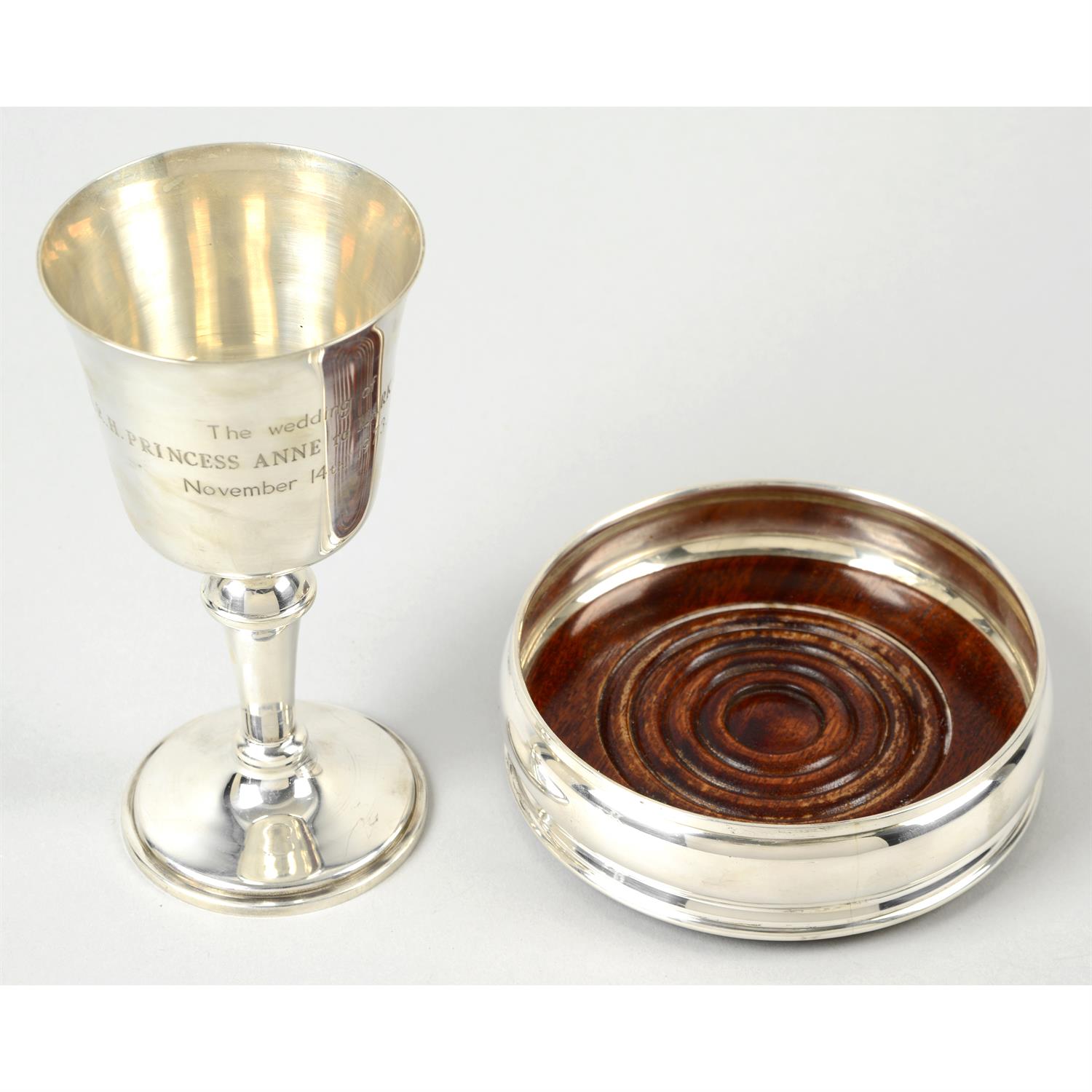 A modern silver royal commemorative goblet; together with a silver mounted coaster,