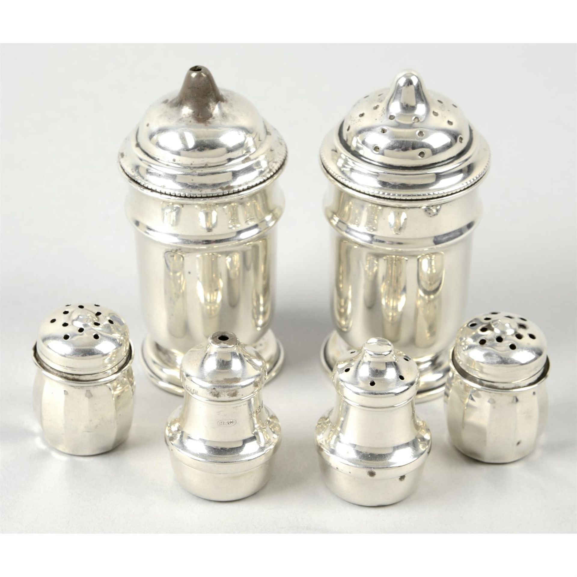 A selection of assorted silver salt & pepper pots, various dates and makers.