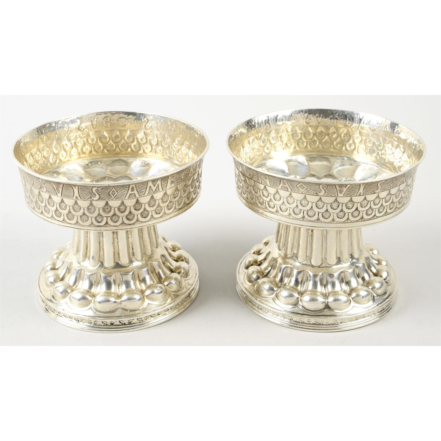 A pair of Edwardian silver pedestal bowls.