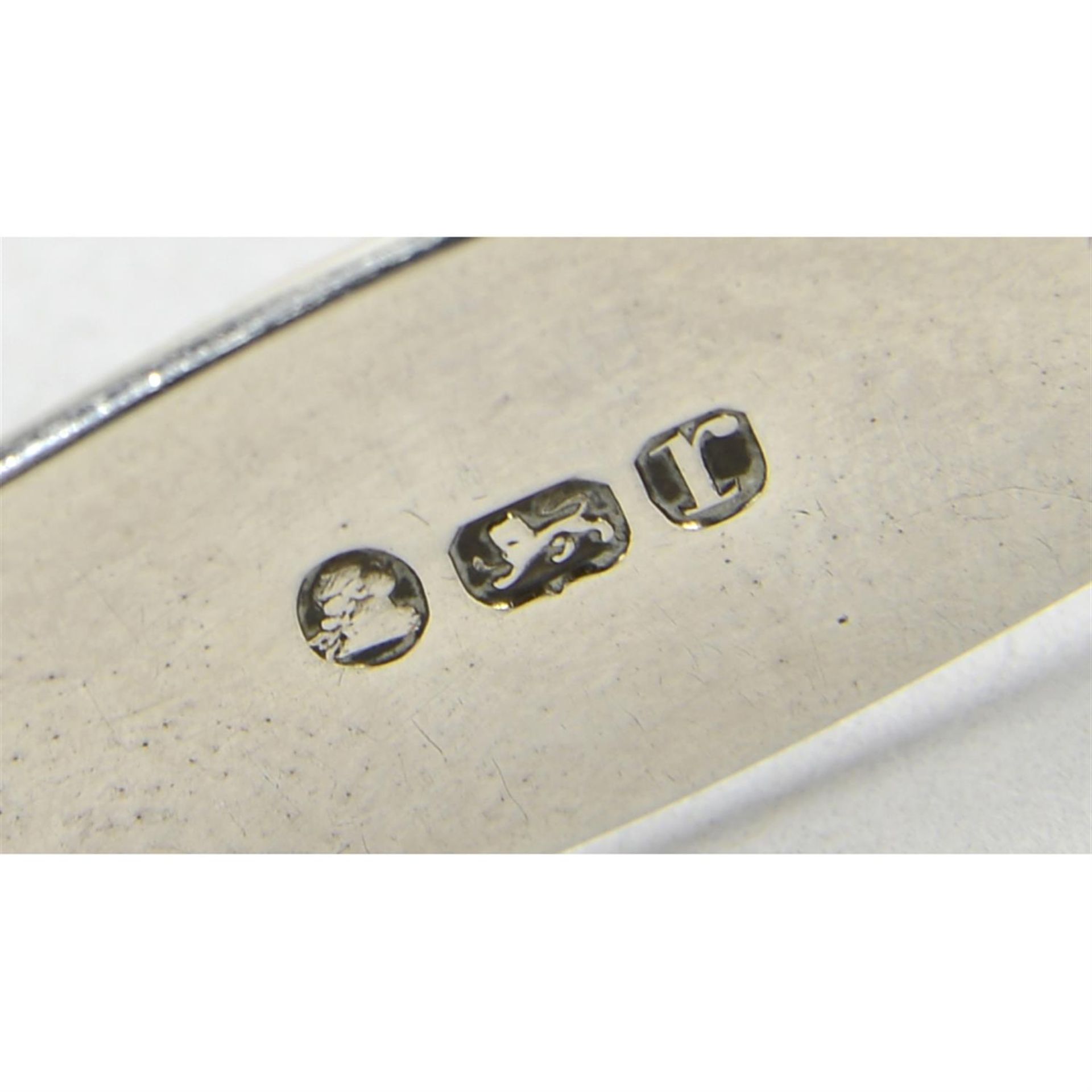 Two pairs of bright-cut engraved George III silver sugar tongs. (2). - Image 2 of 3
