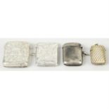 Two late Victorian silver vesta cases; together with two early George V examples. (4).