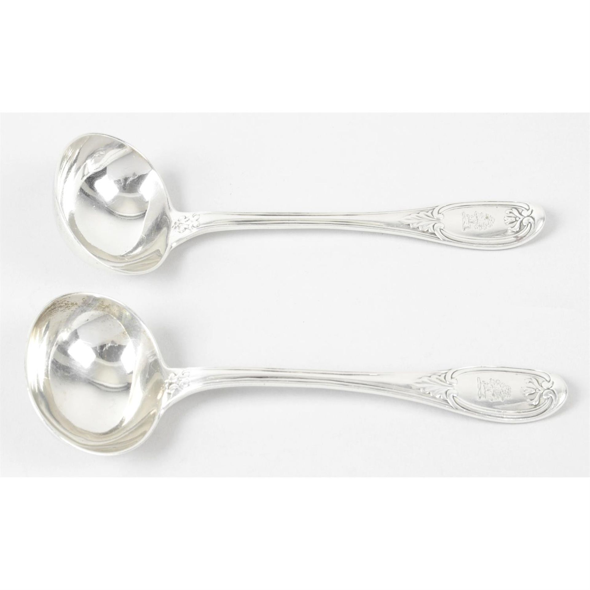 A pair of Victorian silver sauce ladles.