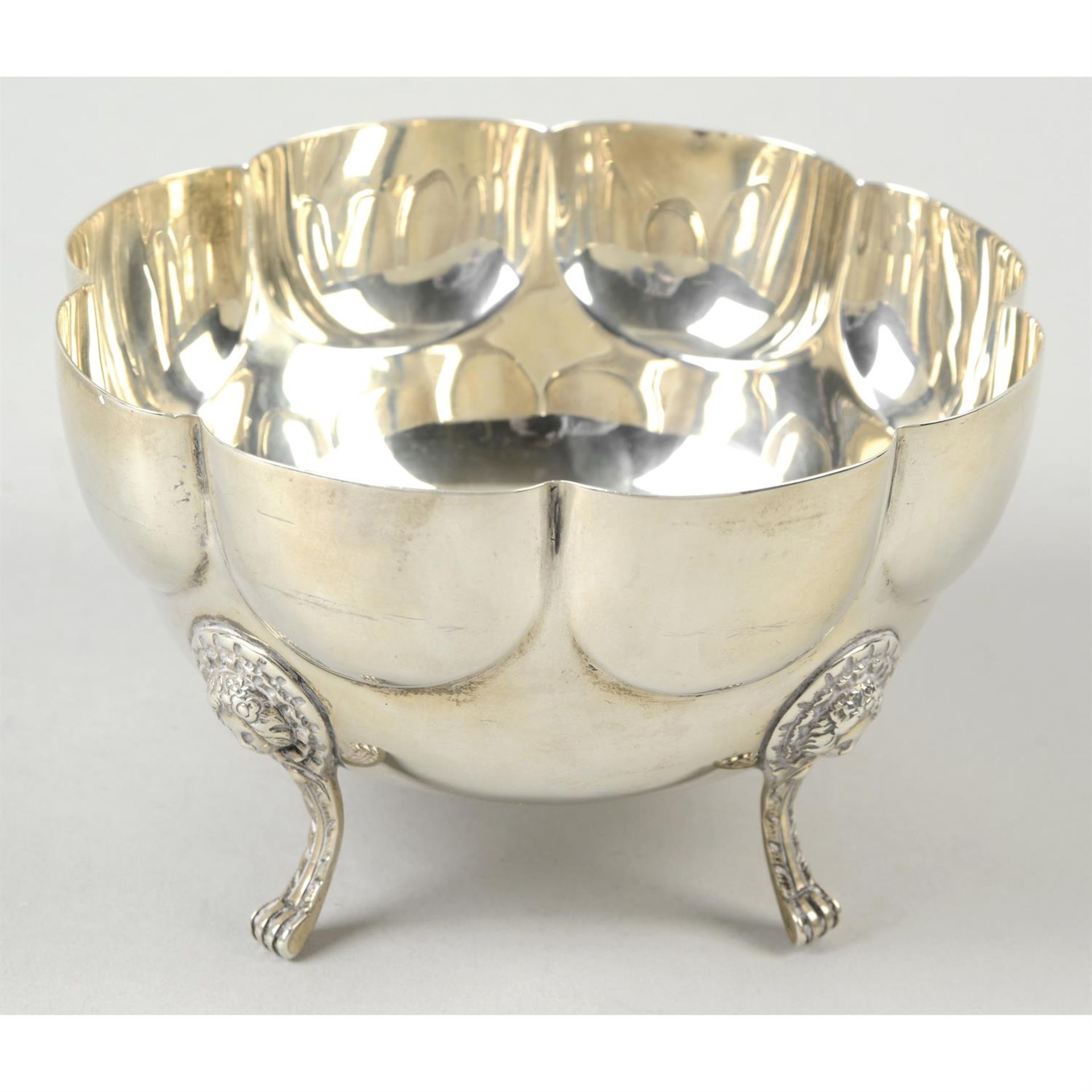 A late Victorian silver circular lobed bowl.