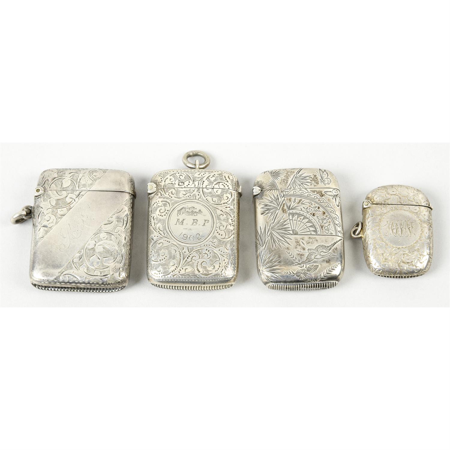 Four late Victorian silver vesta cases.