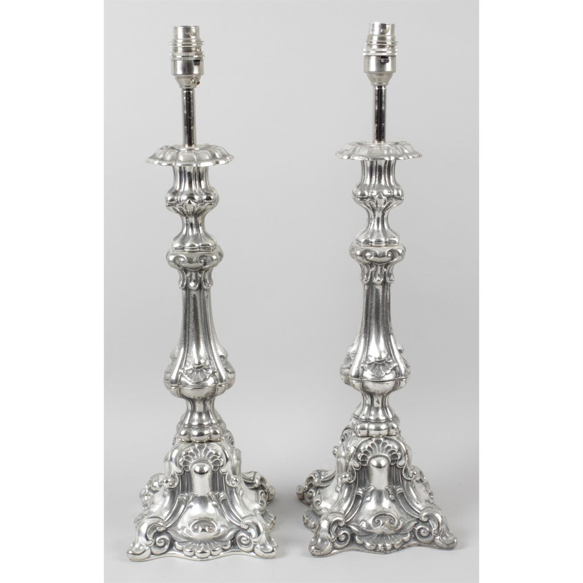 A pair of reproduction cast metal lamp bases.