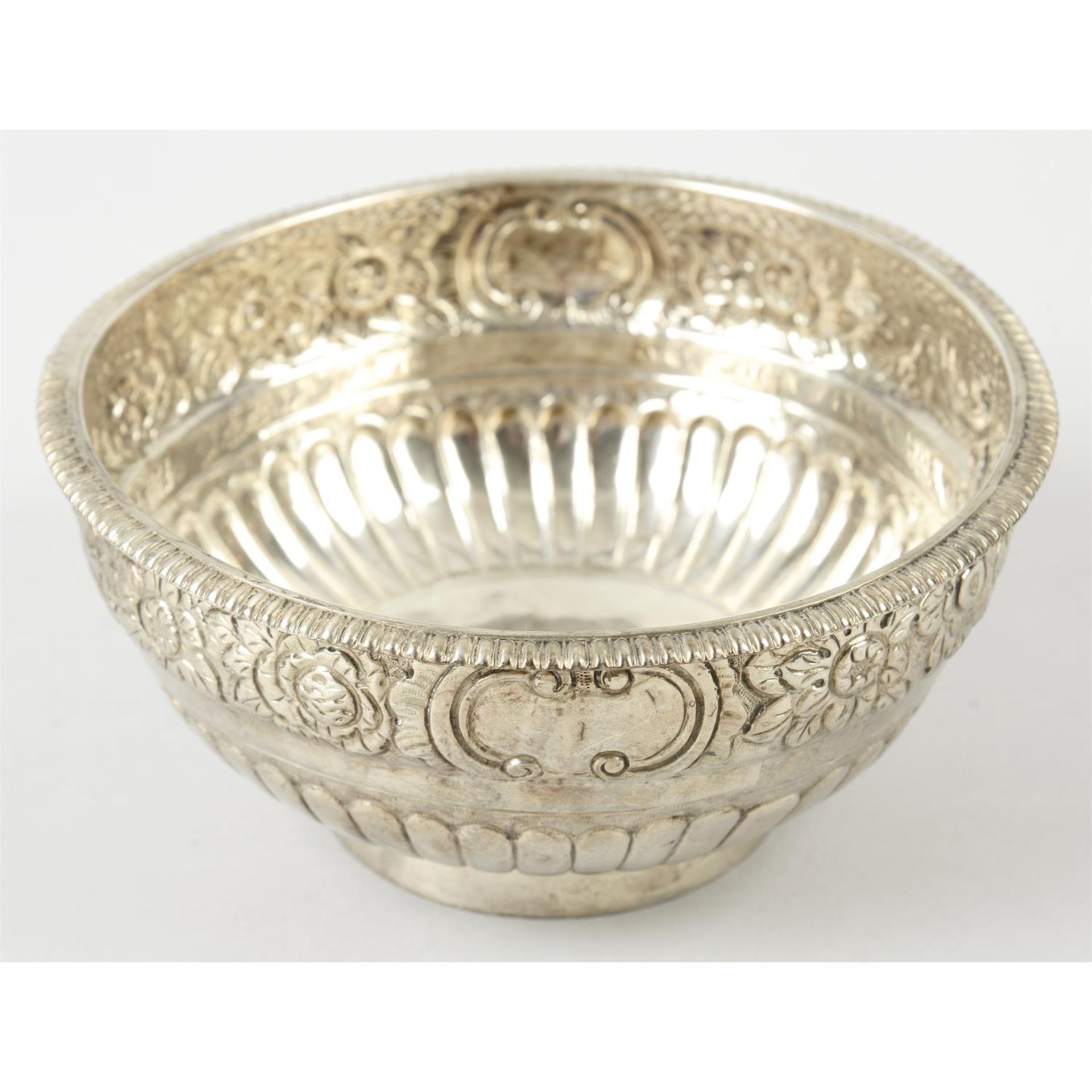 A white metal circular bowl.