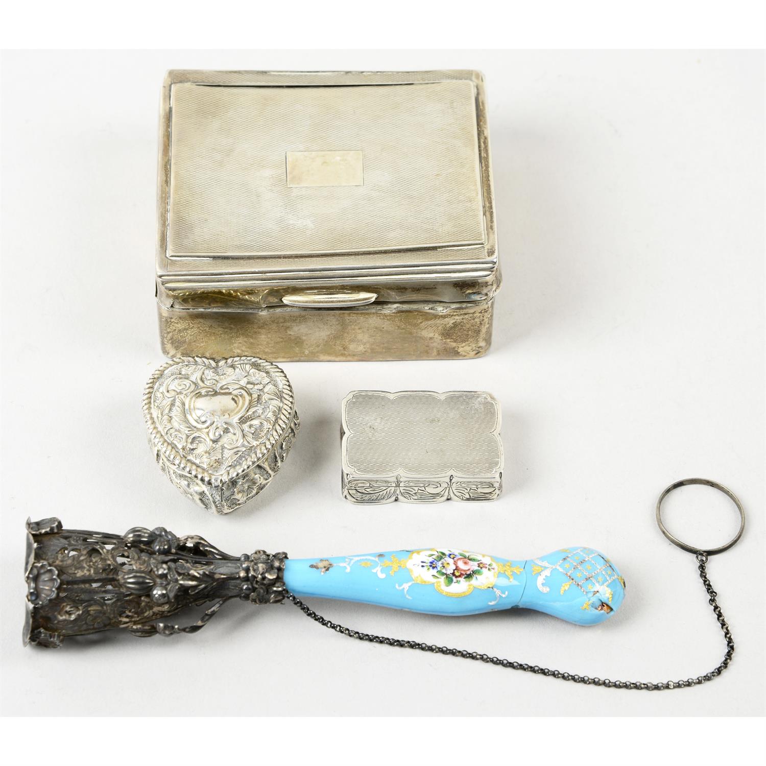 A small selection of novelty items, to include a silver vinaigrette, a silver heart shaped box,