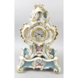 A 19th Century French porcelain cased Jacob Petit mantle clock.