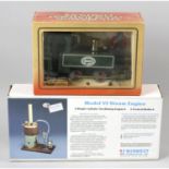 A Mamod SL5 lime steam model train and a Midwest Productions Co., Inc. Model VI steam engine,