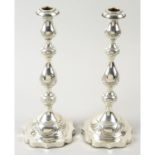 A pair of silver mounted Sabbath candlesticks (filled).
