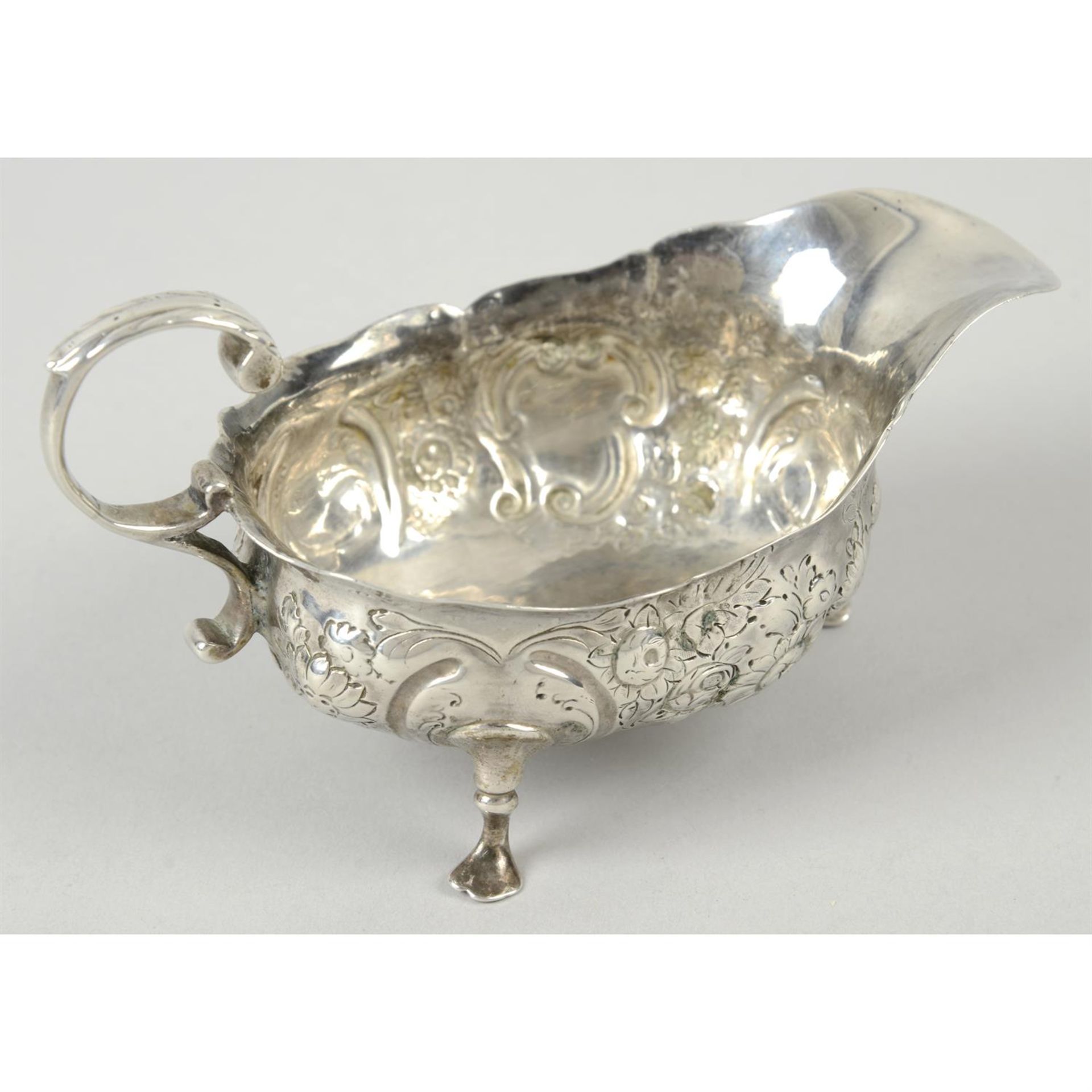 A late George II silver sauce boat. - Image 2 of 3