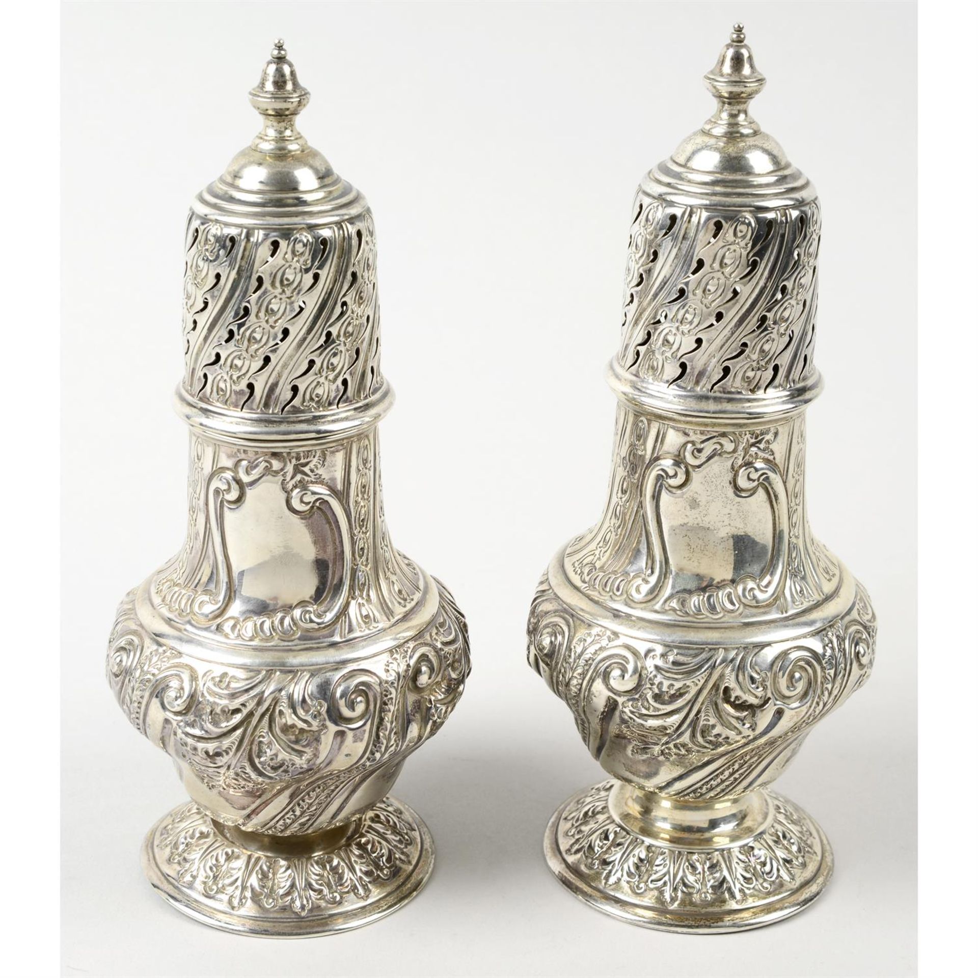 A matched pair of late Victorian silver large casters.