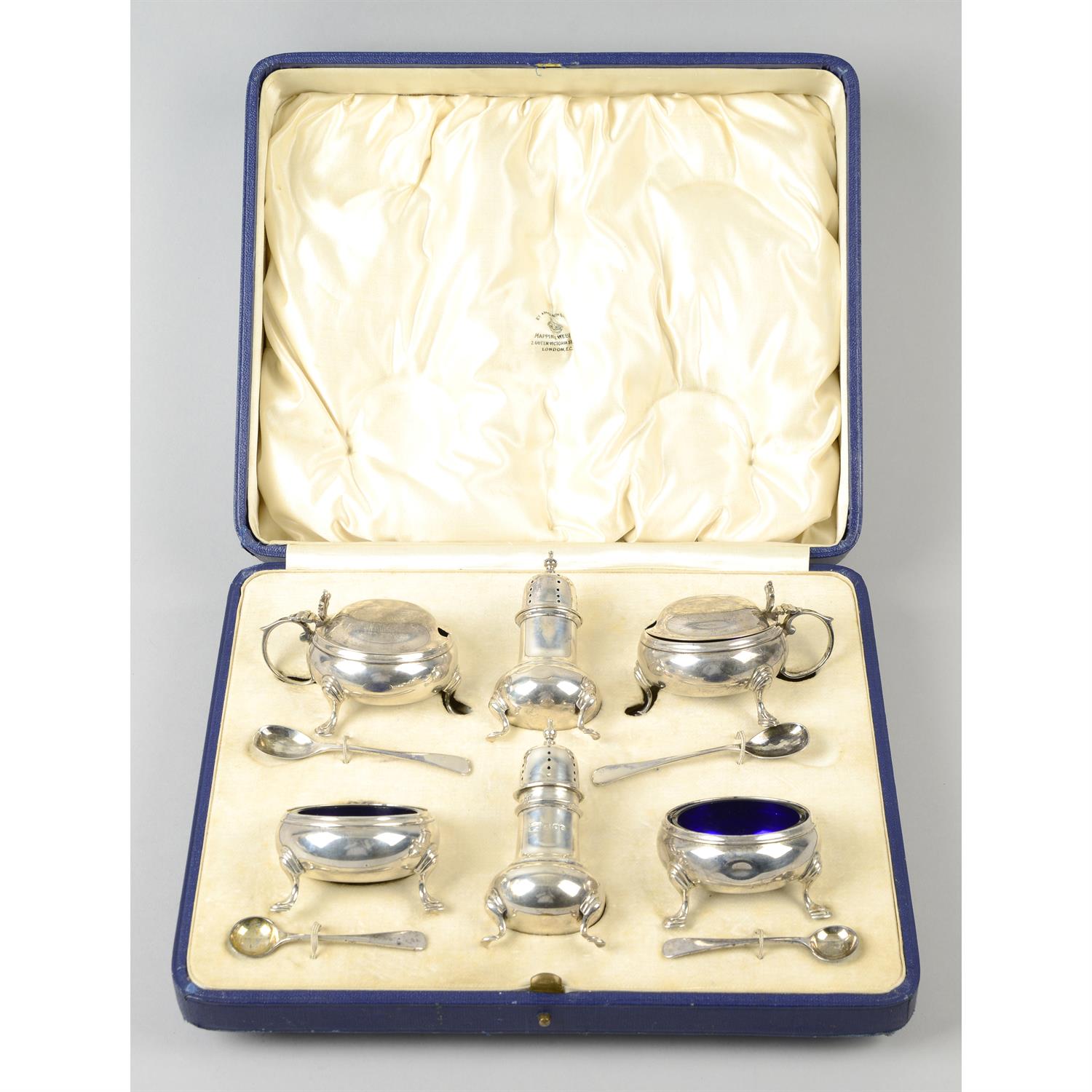 A cased silver condiment set by Mappin & Webb.