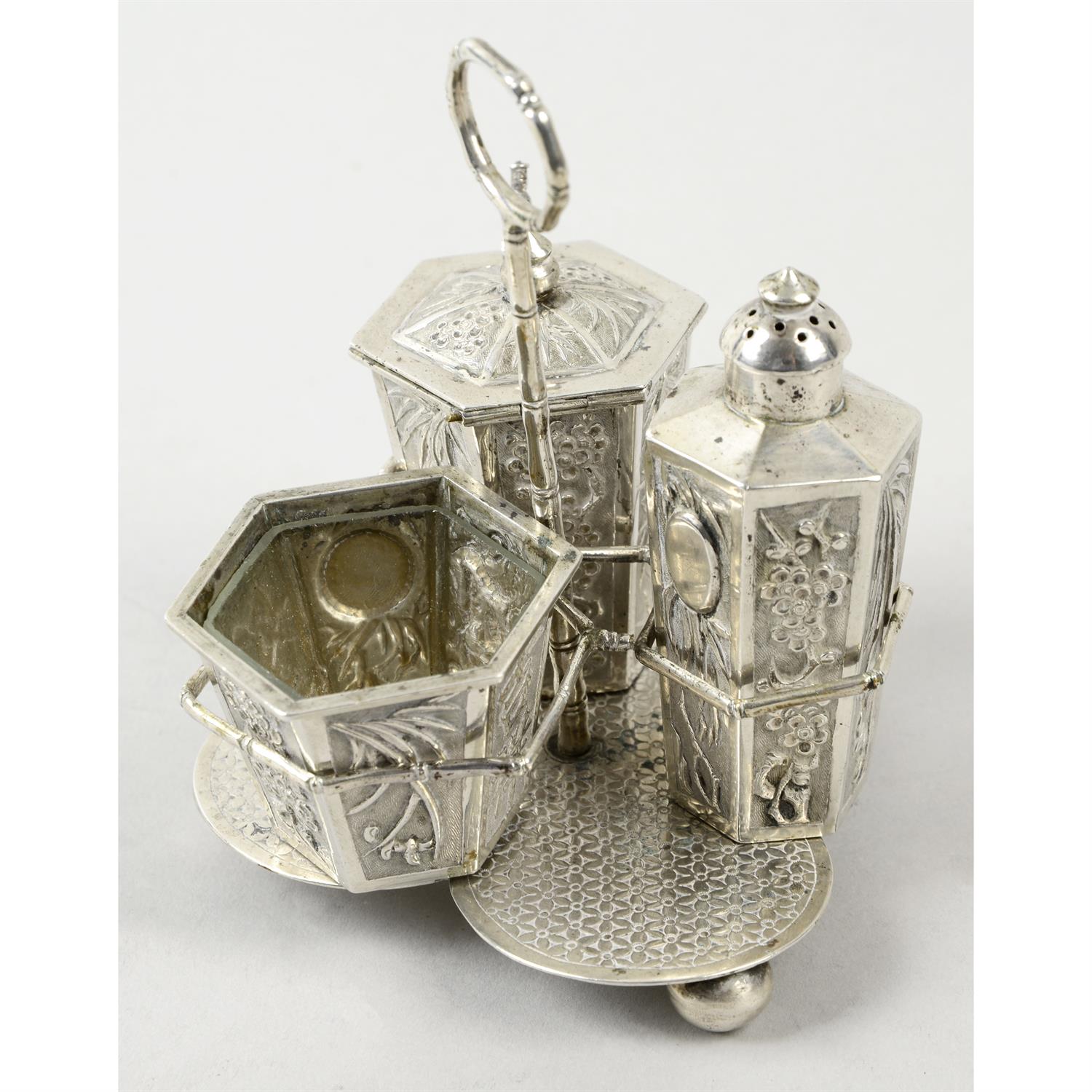 A Chinese export silver cruet set; together with three napkin rings.