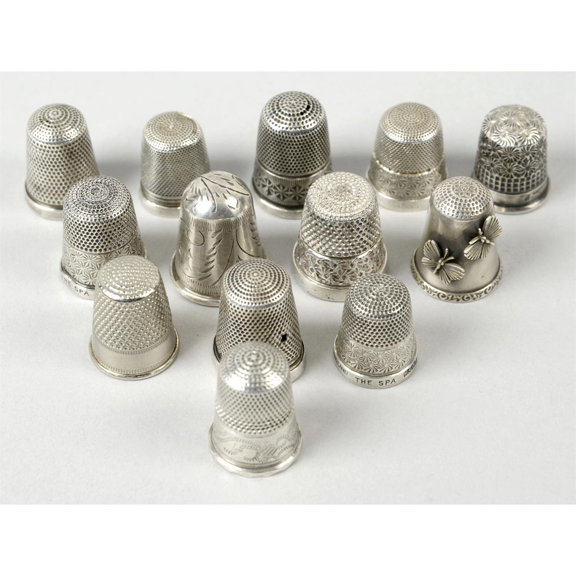 A selection of thirteen thimbles (including unmarked examples). (13).