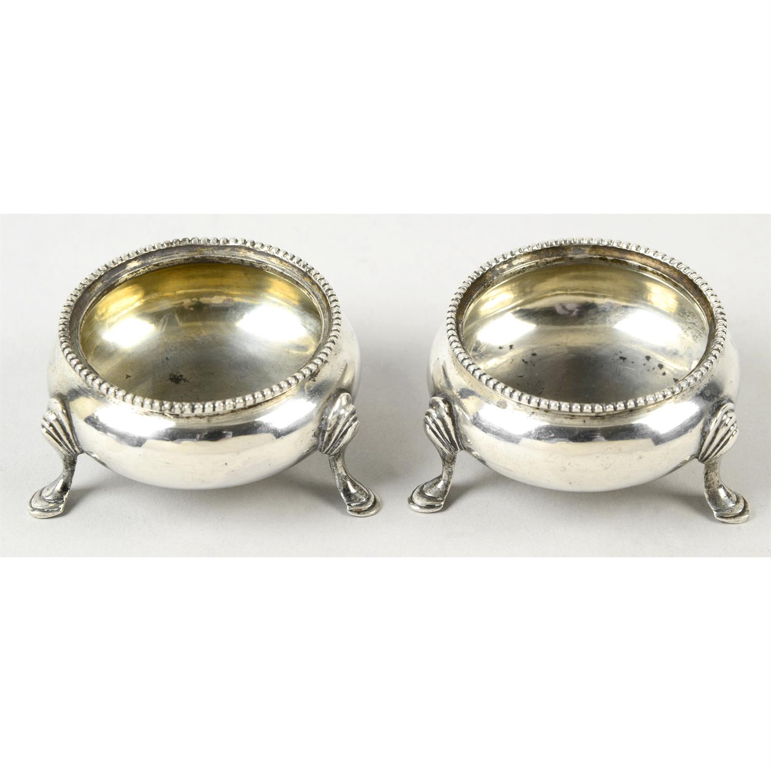 A pair of Victorian silver cauldron open salts.