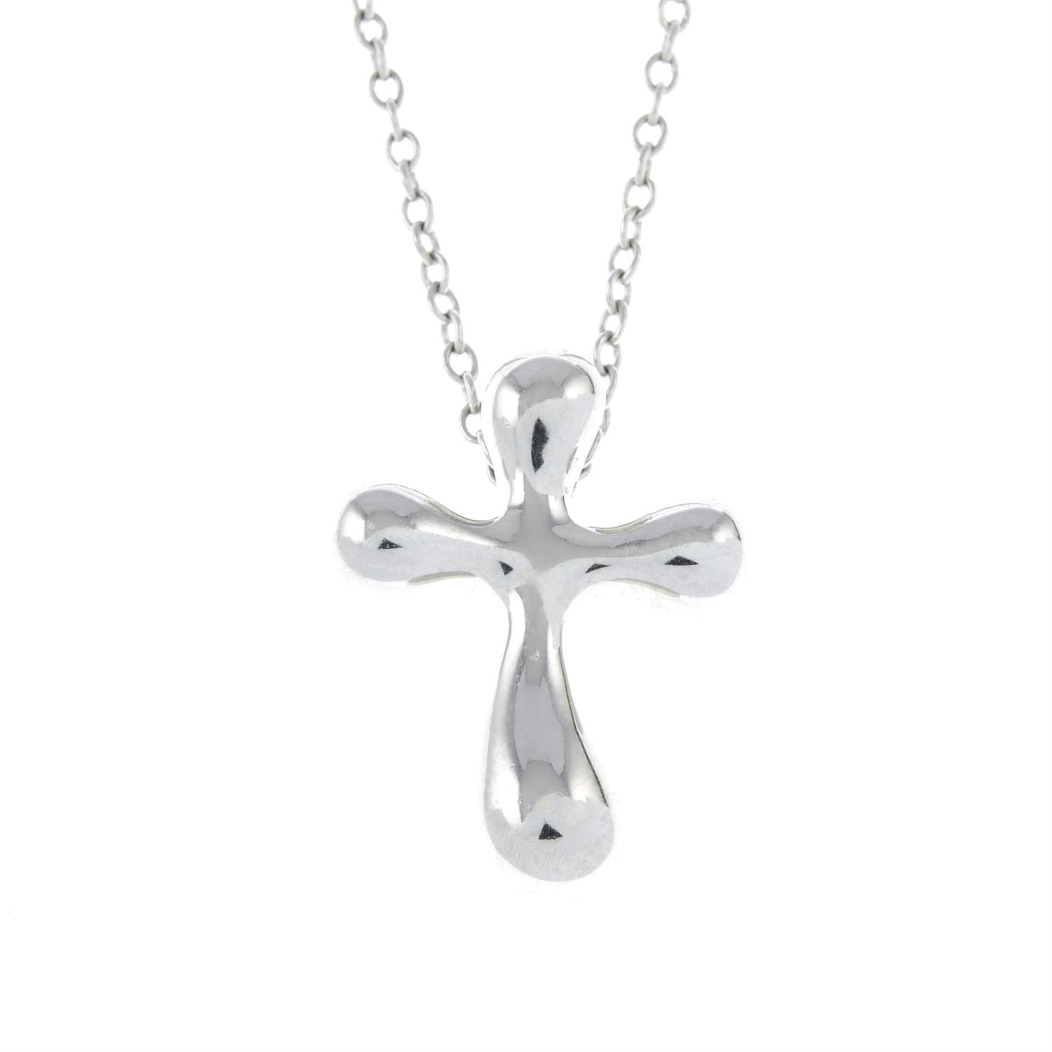 A cross pendant, with chain, by Elsa Peretti for Tiffany & Co.