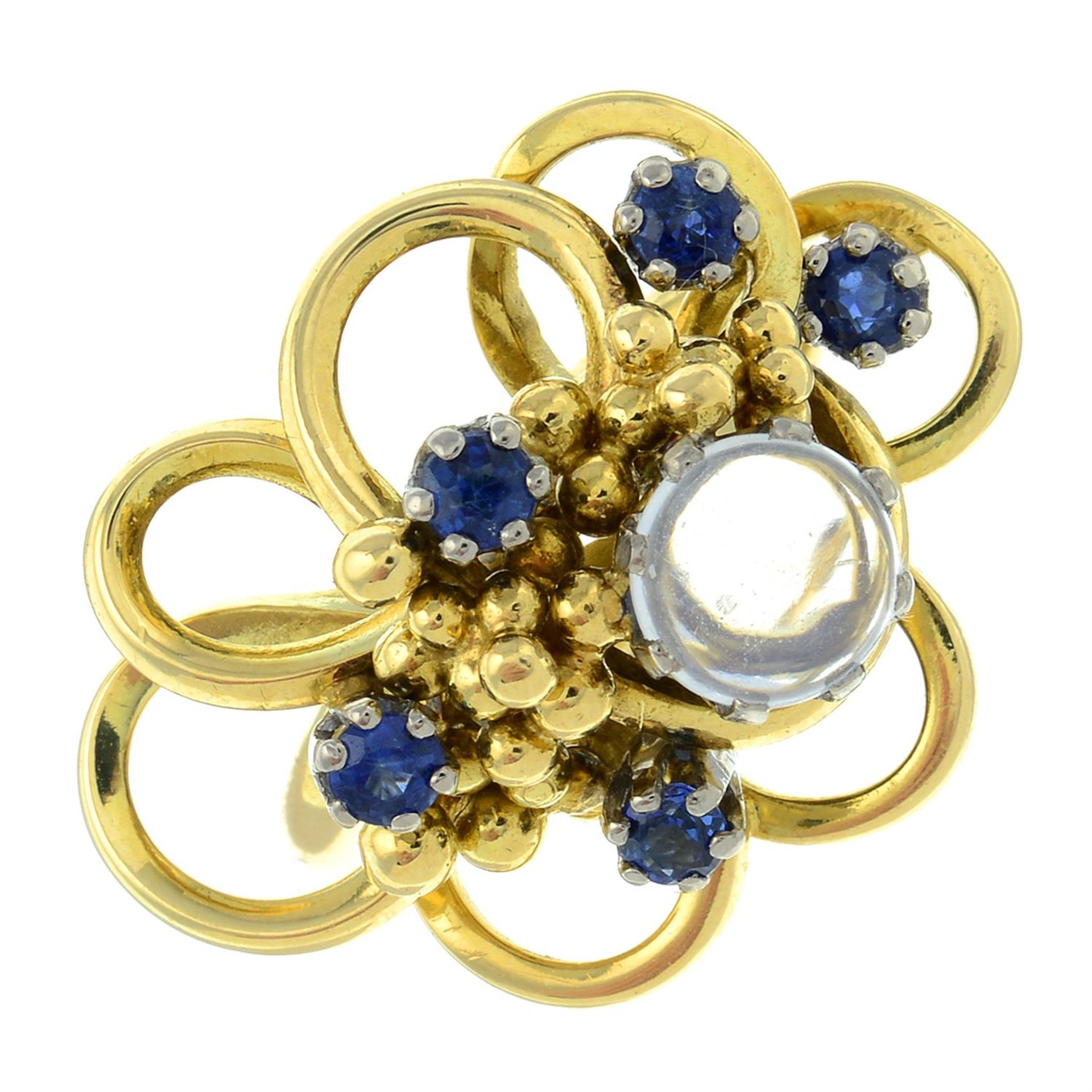 An 18ct gold moonstone and sapphire dress ring.