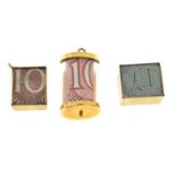 Three 9ct gold emergency note charms.