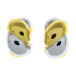 A pair of bi-colour hoop earrings.