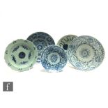 A collection of Chinese 19th Century and later blue and white dishes, each of varying design, four